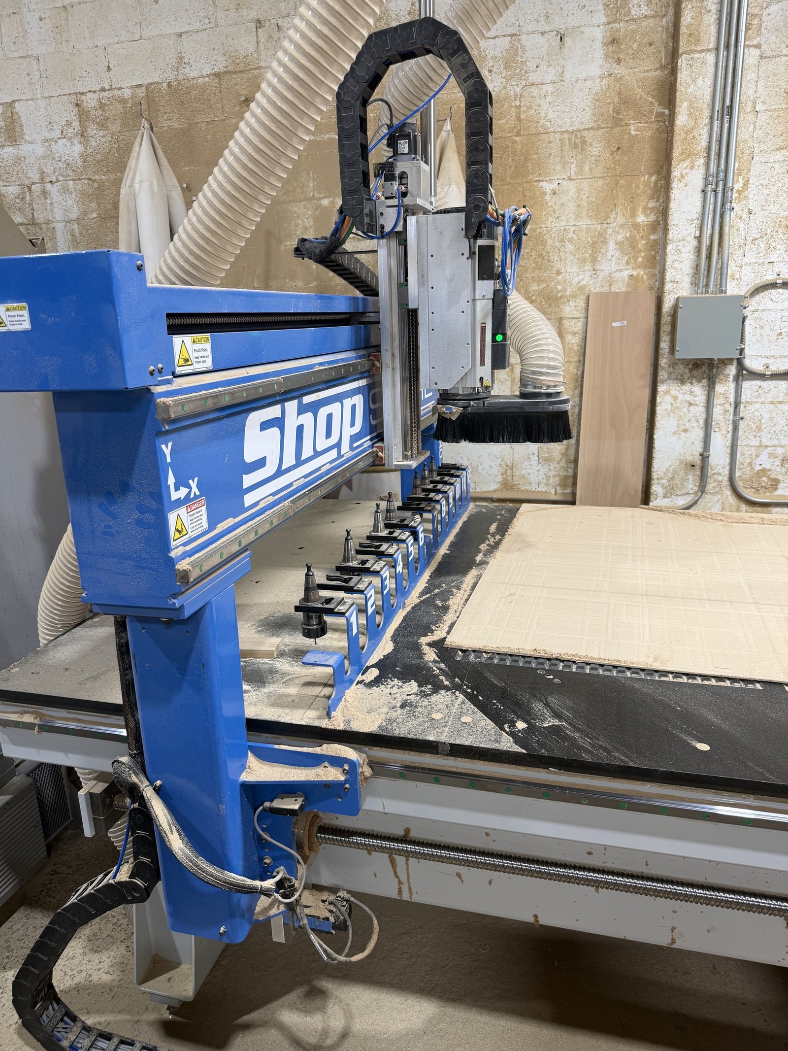 CNC router and tooling in the M11 Design Group shop