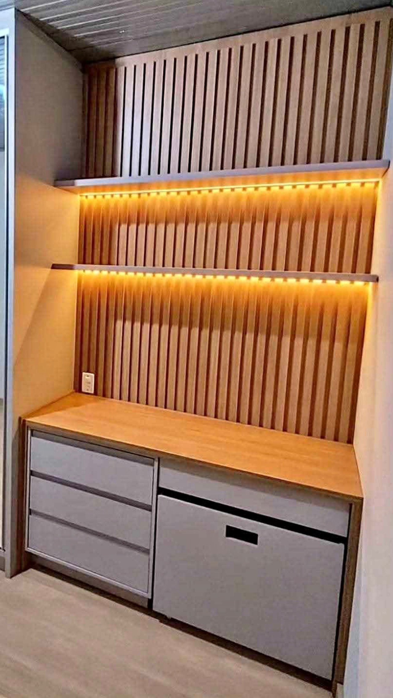 Wood slat wall panelling installed by M11 Design Group in a South Florida home